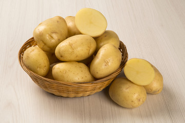 Some potatoes over a white background