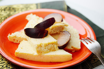 Dairy dessert with plums