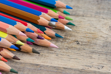 Color pencils on wood background close up ,Color pencils Background for business presentation