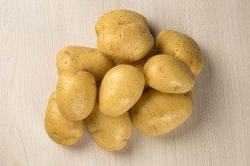 Some potatoes over a white background
