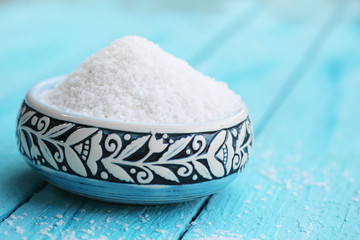 salt in a turquoise bowl