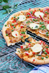 pizza with zucchini on grille