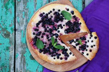 Pies with blueberries, top view