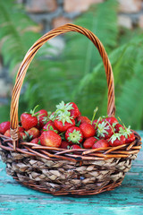 Fototapeta na wymiar strawberries in wicker basket