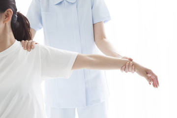 Women undergoing stretch arms