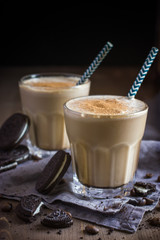 glass of  coffee drink and  cookies