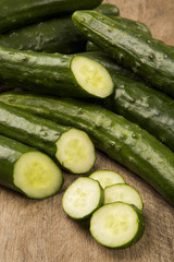 Fresh cucumber on the wooden table