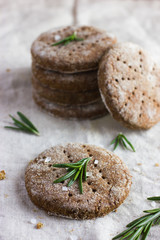 Finnish rye flat bread on rustic background