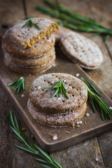 Finnish rye flat bread on rustic background