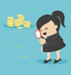 business woman looking on dollar through magnifying glass