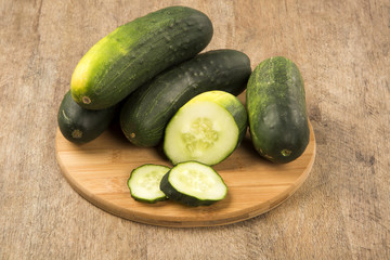 Fresh cucumber on the wooden table