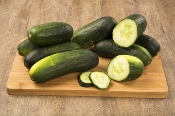 Fresh cucumber on the wooden table