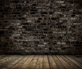 interior with brick gray wall and wood floor