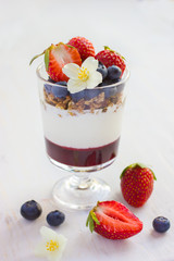 dessert with  berries,  cream cheese, granola  and berries  jam