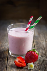 glass of fresh strawberry milkshake