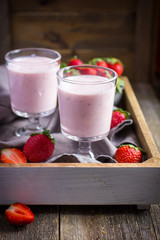 glass of fresh strawberry milkshake