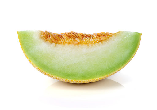 cantaloupe melon slices on white background.