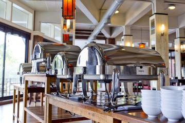 Many buffet heated trays ready for service.