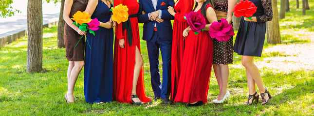 bridesmaids with groom