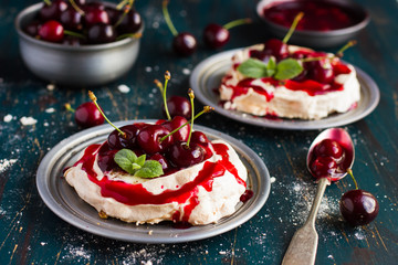 meringues pavlova cake with fresh cherry