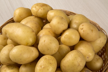 Some potatoes over a white background