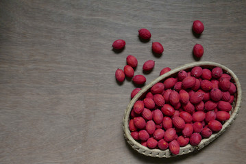 red betel nut in basket
