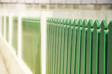 Green wooden fence - image with copy space.
