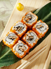 maki sushi roll with eel fish, philadelphia cheese, flying fish caviar