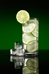 Lemonade of lime and ice cubes