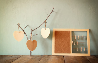 decorative bulletin board with rops and wooden clothespins