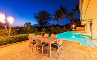 Fototapeta na wymiar Luxury Home with Pool at Sunset