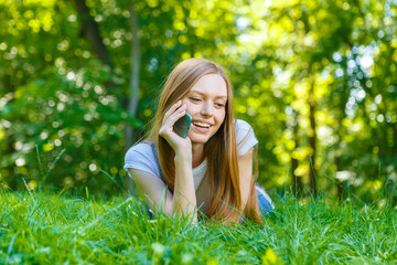 Beautiful smiling red-haired young woman