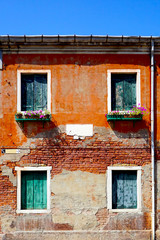 2 doors and 2 windows ancient building