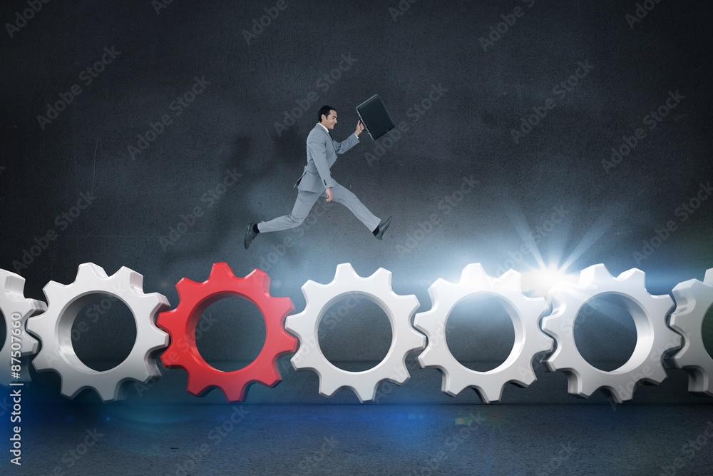 Poster composite image of businessman running with a suitcase