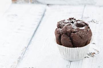 chocolate cake on white vintage wooden background