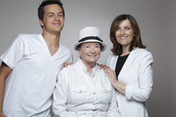 3 generations family in white cloths.