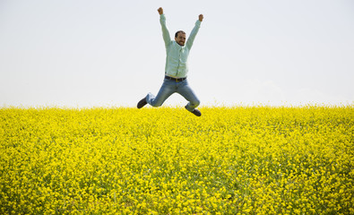 Jumping Happy Young Man