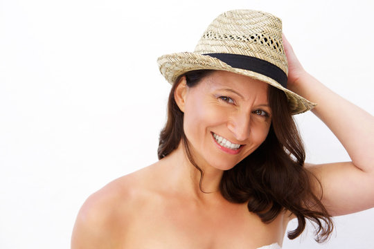 Attractive mid age woman smiling with summer style hat