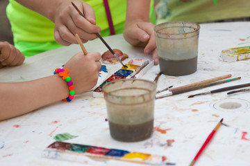 Naklejka premium Children paint watercolor