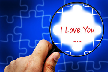 Fototapeta premium I Love You word. Magnifier and puzzles.