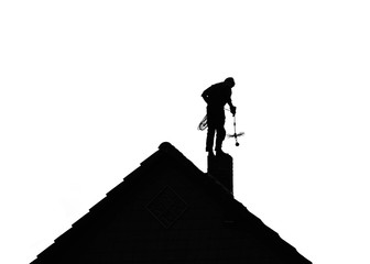 Schornsteinfeger - Silhouette - auf dem Dach