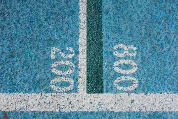 Fototapeta na wymiar Measurement Numbers on a Running Track