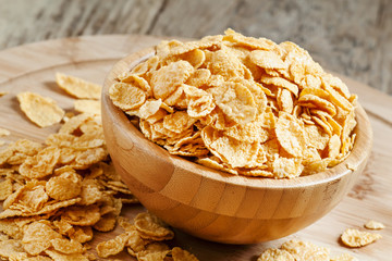 Corn flakes in a bowl, selective focus