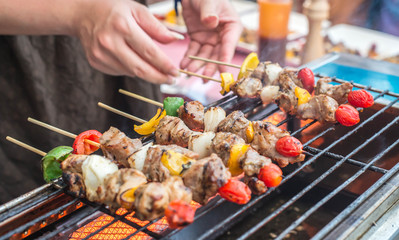 Naklejka premium delicious beef bbq on grill