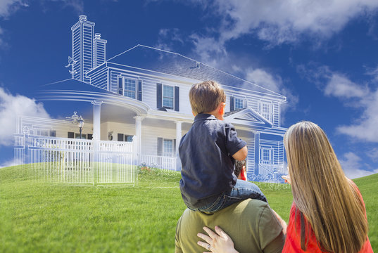 Young Family Facing Ghosted House Drawing Behind