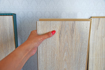 female hands take laminate