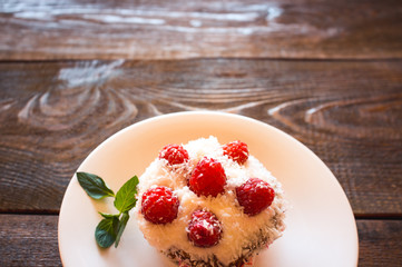 Vegetarian raspberry cake and fresh mint