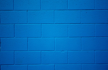 Naklejka premium Blue colored brick background.