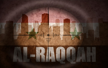 sniper scope aimed at the abstract silhouette of the city with text Al-Raqqah at the vintage syrian flag. concept