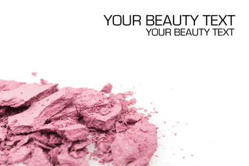 Crushed eyeshadows on white background